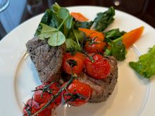 beautifully cooked steak in the Emirates Glasgow lounge 