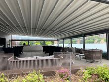 With the roof closed against the rain and direct sun