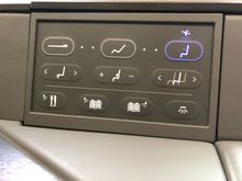 The seat console was pretty self-explanatory and I didn't need any guidance to use it. I had to use the right-center button to move myself closer to the tray table for the meals, tho