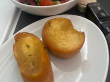 Garlic bread on AC 857 yesterday.  I was so hard that I feared to eatbecasue I wanted to spare the time and expense of any dental damage caused.  On the bright side, the nut ration was pretty good.