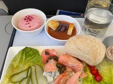 Decent trout salad on way back from Edinburgh but I have no idea what the odd brown starter was with black olives and croutons - some sort of set consome?

Even after eating it I have no idea!

Any thoughts?