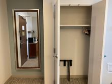 Closet space next to suite entrance