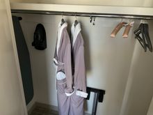 In the bedroom closet you can find the bathrobes, iron&board