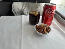 Starting lunch service with a drink and mixed nuts