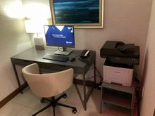 PC + laserprinter in alcove : opposite of the restroo s
