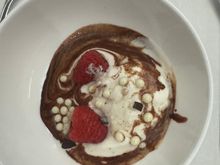 Partner asked cabin crew to suggest a dessert, and they said he should try the chocolate bar. A few minutes later this turned up. Confused he ate the fairly melted ice cream and enjoyed.