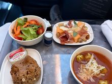 Salad, prosciutto mix, warm bread, and tomato nail soup.  