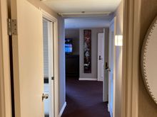 Seen from the other side: The second corridor leading from the room's front door towards the bedroom 