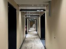 Hallway leading to room.