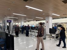 One metal detector shared by both Clear and PreCheck. This is looking back towards the belt after exiting the WTMD.