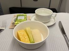 Sliced fruits, chamomile tea