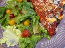 Salad and deep dish pepperoni and spinach. 