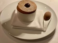 Plum Armagnac soufflé with chocolate ice cream