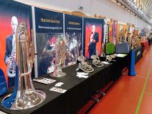 Instrument makers and retailers set up their stalls in the same space, with big photos of their representative soloists 