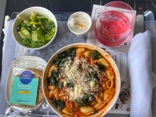 Lunch platter with minestrone style pasta, kale, salad and cookie 