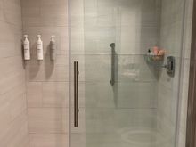 This is the most annoying part of this renovation. You must walk all the way into the shower to turn on water. Naturally you will get blasted with cold water while you try to dash out. 
