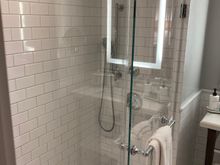 Showerstall with overhead and handheld 