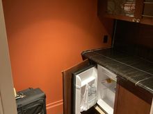 Left of the entrance door is a small annex with an extra empty fridge to store your own stuff in ..... interesting fact, when switching the lights on here, an exhaust start humming .... could be in the past this was the location if a second toilet ?