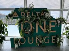JFK Delta One Check-In Entry- Delta One Lounge display