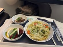 This was dinner on KIX-HEL, a broccoli pasta. I actually got served a very similar dish when travelling F on JAL, but this one was actually much better and not as insulting as the slop I got on JAL. The side dishes were incredibly uninspired though.