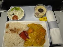 Chickpea and sweet potato curry, possibly celeriac/coleslaw salad, possibly some kind of apple dessert with mousse? No menus so unsure what this actually was