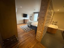 But beware there is no seperation between the bathroom and living room, so don't forget to dry your feet before slipping on the wooden floor....