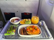 Three cheese quiche with cherry tomatoes; sides of fruit, Greek yogurt, and a packaged muffin. Other option was a French toast bread pudding. Basically similar to D1 except it’s a croissant in D1 in place of the muffin
