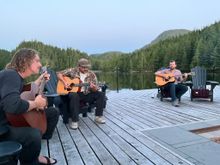Twilight song fest around campfire