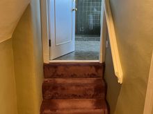 Duplex suite had strange stairways and older carpet