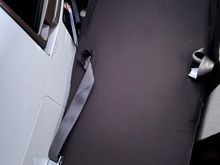 You get a mattress pad to put over the seat. But also, the seat can't really recline the way DL can. Instead you have to stand up and it basically flips. 
