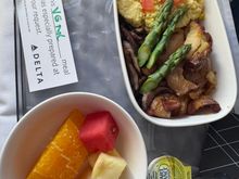 Vegetarian non-dairy option. Eggs, potatoes, mushrooms, asparagus , tomatoes with fresh fruit side. Pretty good. 