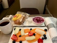 GFML breakfast; fruit, yoghurt, and a bread roll