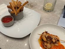 Shrimp was presented more in line with AA’s press release versus what it looked like a few weeks ago. Truffle fries were ok. 