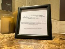The most polite "If you take the Diptyque products we'll charge you" note I've ever seen