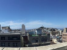 From corner club level room; view includes the Fairmont, Coit Tower, Transamerica Pyramid, and 650 California Street.
