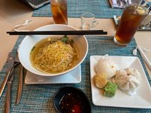 Westin restaurant breakfast of noodles, char siu bao, siu mai dumplings.