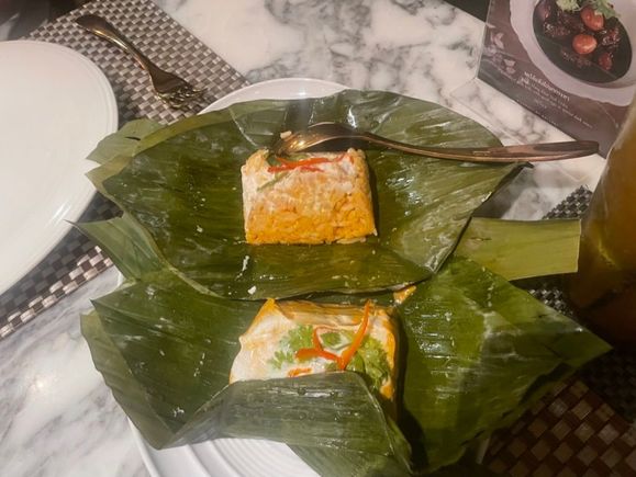 Steamed Rice and Fish Curry in Banana Leaves 
