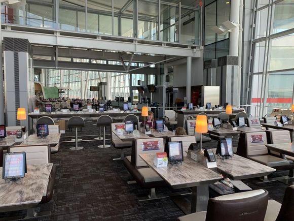 There were literally thousands of seats to choose from in the hammerhead area of Terminal 1. The closest people to us were over a hundred metres away.