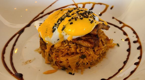 Pork belly moco over kim-chee fried rice.  Egg over easy with garlic aioli.  Sweet soy sauce reduction.  My absolute favorite thing is the slab bacon/pork belly.  So good in fact...