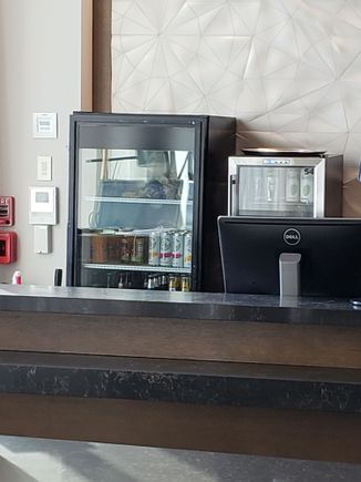 Alcohol behind the check in desk.