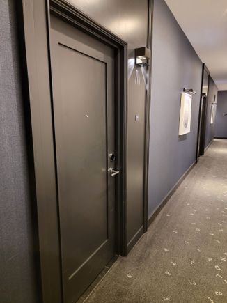 Lights project your room number onto the wall by the door