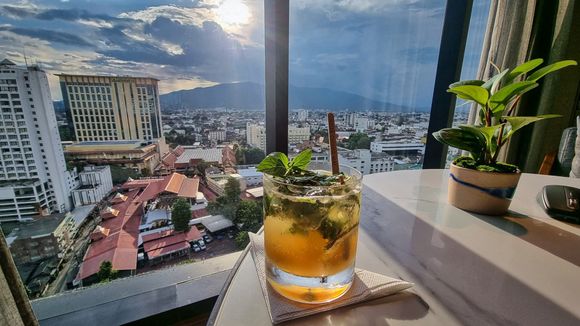 Cocktail of the day with a great view, delicious food, and a beautiful, calm, comfortable environment. Perfection.