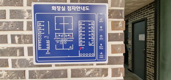 Toilet have maps. It makes more sense when you realise they are also braille