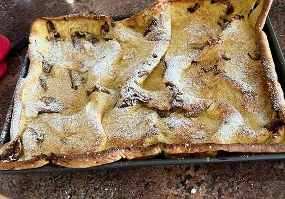 Cinnamon Apple Dutch Baby. Got a nice “puff” on it!