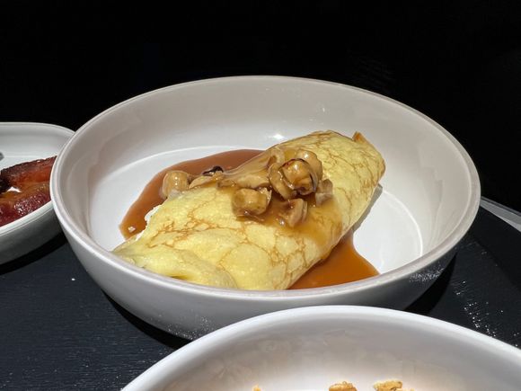 CRÊPES - hazelnuts, ricotta, praline sauce.