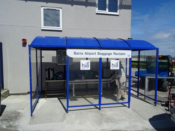 At what must be the world’s smallest baggage reclaim, the gentleman on the right happily picked up by bag and started to walk of with it.  Clearly a mistake but there were only half a dozen bags to chose from.