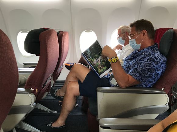 Albert Verlinde Reading the AmanDari brochure