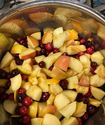 Apples, cranberries, orange zest, the juice from that orange, and water. 