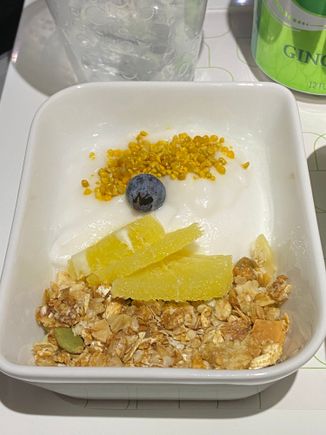 Coconut yogurt - seven-grain house-made granola, bee pollen, orange, blueberry, almonds