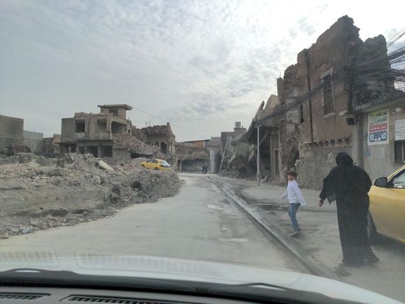 what remains of Mosul, following air strikes on ISIS